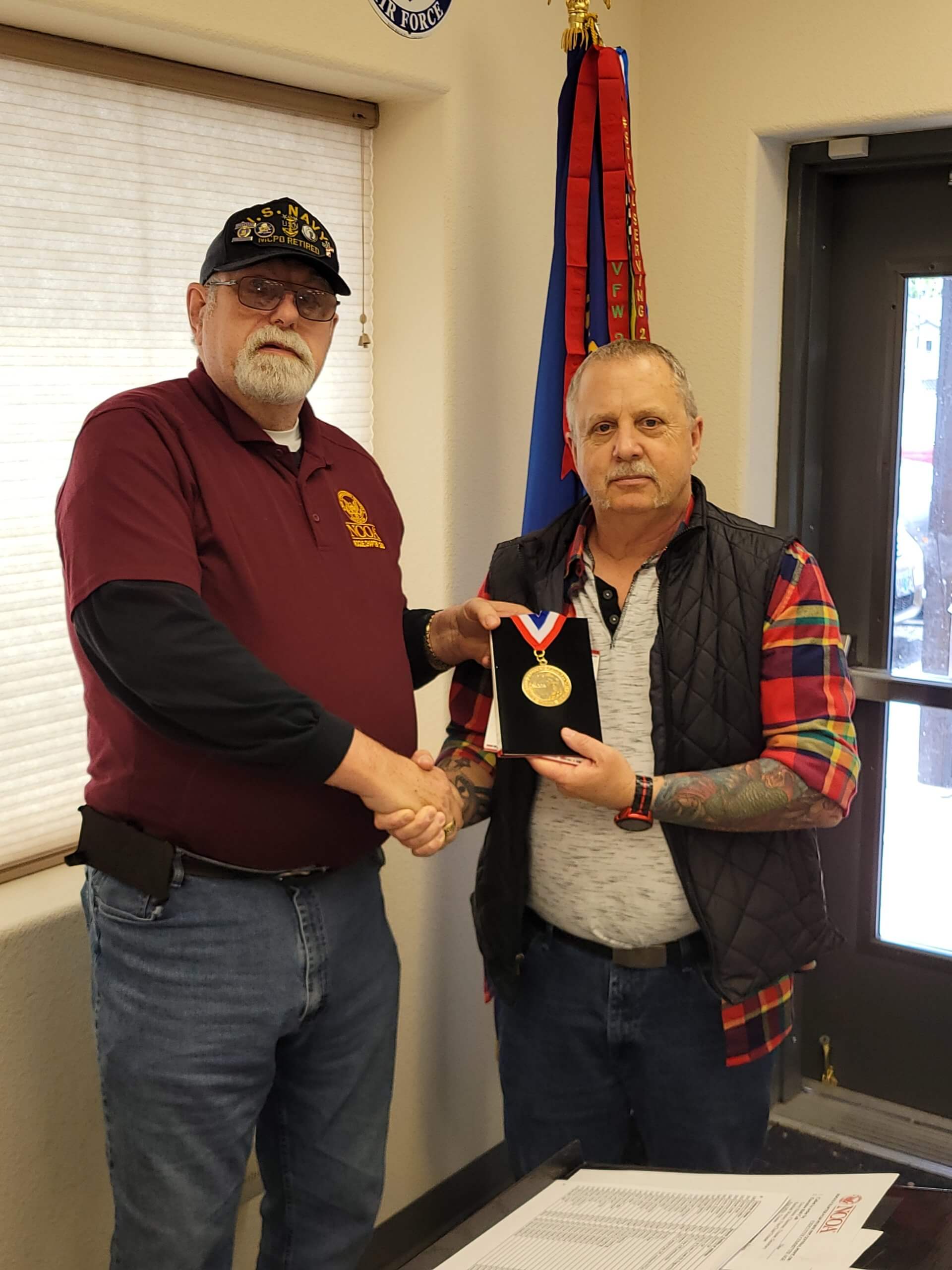 Chairman Terry Haines presents WW2 Medallion to Rogue Chapter trustee Paul Mills, son of Army veteran Scott Mills at our monthly Executive meeting.
